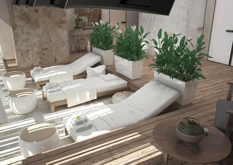 Không gian có cây xanh và giường massage trắng hiện đại sang trọng