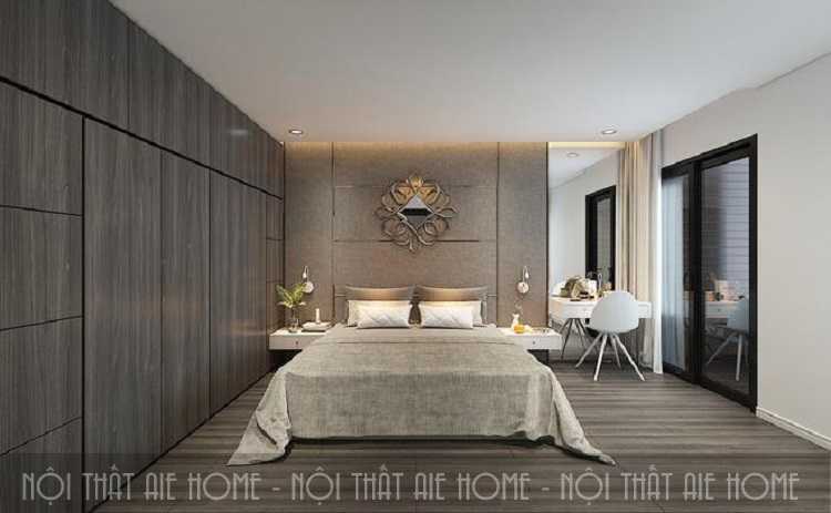 Không gian phòng ngủ được thiết kế đơn giản với gam màu trầm