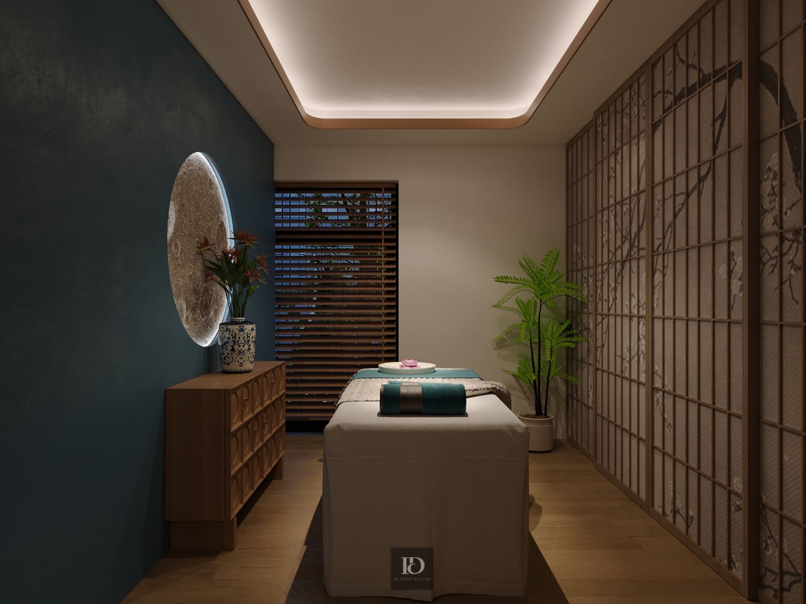 Phòng trị liệu với điểm nhấn mảng tường xanh thẫm và trang trí mặt trăng phát sáng.